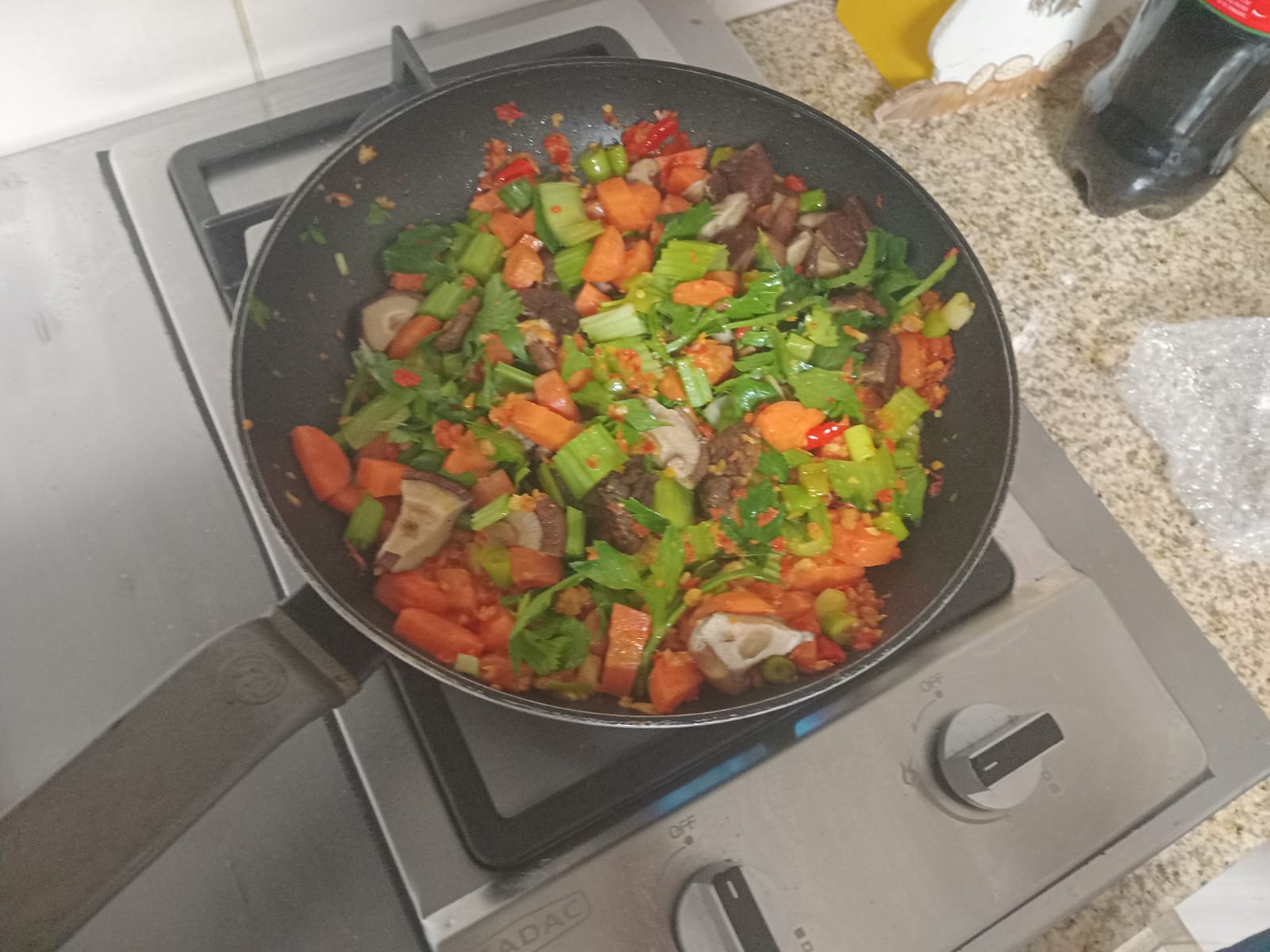 carrot, celery and shiitake added to the wok